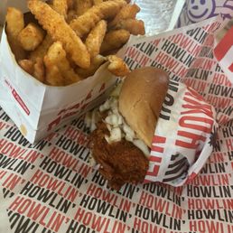 Chicken sandwich and Cajun Fries Chicken sandwich and Cajun Fries