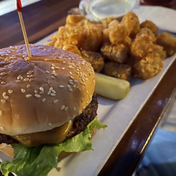 The Lime - a hamburger and fries on a plate - Sports Bars Near Me - Kirkland, Washington The Lime - a hamburger and fries on a plate - Sports Bars Near Me - Kirkland, Washington