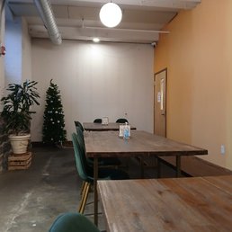 They have a few of these large tables in the back for larger groups or more spread out working styles.