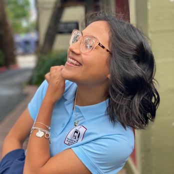 Tabula Rasa - Dianna Carmenaty realizing how cute and flattering the hairstyle is! - Hair Salons Near Me - Alamo Heights, Texas