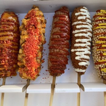 Two Hands Corn Dogs - Spicy 1/2 cheese 1/2 beef, Potato corn dog, all American, Sugar/ranch, crispy rice dog - Korean Near Me - Torrance, California Two Hands Corn Dogs - Spicy 1/2 cheese 1/2 beef, Potato corn dog, all American, Sugar/ranch, crispy rice dog - Korean Near Me - Torrance, California