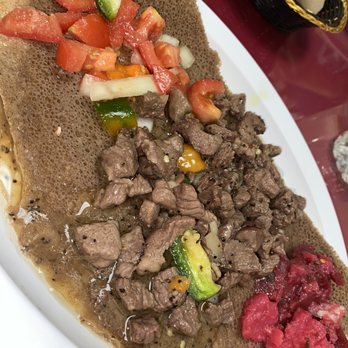 Mitmita Ethiopian Restaurant - Lamb tibbs, beets, tomato salad - Ethiopian Near Me - Tampa, Florida Mitmita Ethiopian Restaurant - Lamb tibbs, beets, tomato salad - Ethiopian Near Me - Tampa, Florida