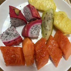 Hibachi Grill Buffet - Fruits platters: Dragon fruits, papayas, cactus, and pineapples.
