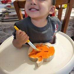 Learning to paint and developing fine motor skills