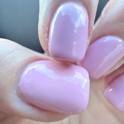 Cut on side, sloppy polish, dry sides with polish stick on skin.