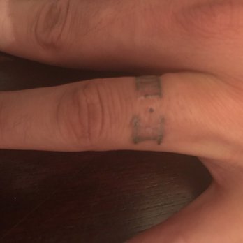 Nuclear Crayon - $60 for this butchered ring tattoo. - Tattoo Near Me - Springfield, Massachusetts
