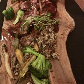 Francesca's Cucina - Rack of lamb served on a unique cutting board for display, medium rare was incredible - Italian Near Me - Syracuse, New York
