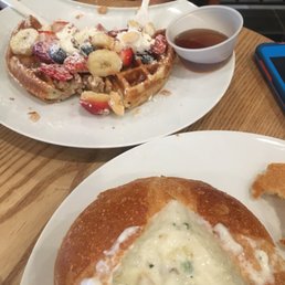 Breakfast brunch. Waffles with fruit toppings and bread soup(clam chowder) Breakfast brunch. Waffles with fruit toppings and bread soup(clam chowder)