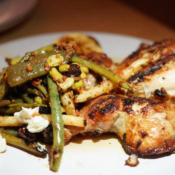 Constantine - a plate of food on a table - Mediterranean Near Me - Toronto, Ontario
