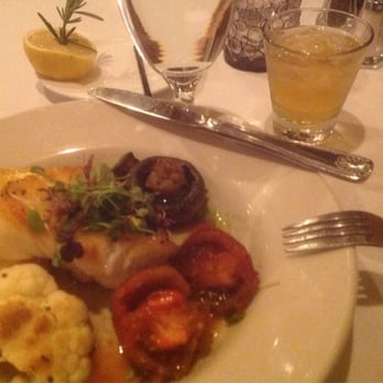 Bistro On the Boulevard - My entree, Chilean Sea Bass. Perfect. But note, the sautéed red tomato's. Outstanding. - New American Near Me - Saint Joseph, Michigan Bistro On the Boulevard - My entree, Chilean Sea Bass. Perfect. But note, the sautéed red tomato's. Outstanding. - New American Near Me - Saint Joseph, Michigan