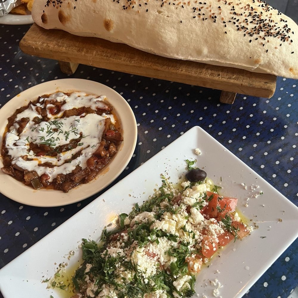 Ali Baba - Feta, tomato and parsley salad with olive oil; eggplant stew topped with yogurt sauce; lavash (bread) - Turkish Near Me - San Juan, Puerto Rico Ali Baba - Feta, tomato and parsley salad with olive oil; eggplant stew topped with yogurt sauce; lavash (bread) - Turkish Near Me - San Juan, Puerto Rico