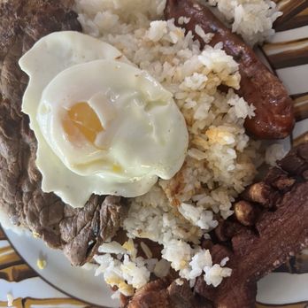 El Paraiso De Acapulco - Steak, rice, fried plantains, avocado, Colombian sausage, fried pork skins. Topped with a fried egg - Mexican Near Me - Hopatcong, New Jersey El Paraiso De Acapulco - Steak, rice, fried plantains, avocado, Colombian sausage, fried pork skins. Topped with a fried egg - Mexican Near Me - Hopatcong, New Jersey