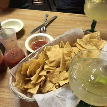 Amigos - Fresh hot corn ships and very mild salsa. Just ask and they will bring some nice and spicy green salsa! - Mexican Near Me - Topeka, Kansas