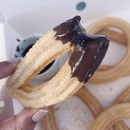 Churro dipped in chocolate! Churro dipped in chocolate!