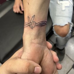 Just Skin Tattoos and Piercings - Tattoo