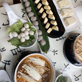 Legendary Hot Pot - Tomyum soup with side dishes - Hot Pot Near Me - West Vancouver, British Columbia Legendary Hot Pot - Tomyum soup with side dishes - Hot Pot Near Me - West Vancouver, British Columbia