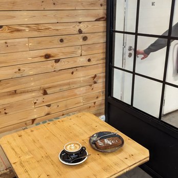 Fábrica Coffee Roasters - Cappuccino and banana bread - Coffee Roasteries Near Me - Lisbon, 11 Fábrica Coffee Roasters - Cappuccino and banana bread - Coffee Roasteries Near Me - Lisbon, 11