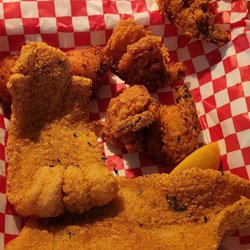 Cajun Creation - Catfish(2) fillets, shrimp (4) & hushpuppies (2)