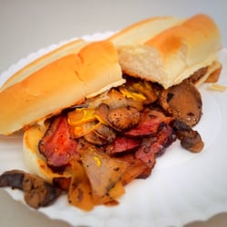 Gorilla Gourmet - Gorilla Grinder: Beef Brisket, Onions, Mushrooms, Pepperjack Cheese & Sriracha on a Toasted Bun. Awesome sandwich.