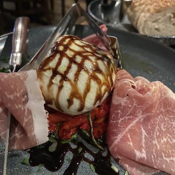 Burrata - The burrata! (With balsamic, roasted red peppers and prosciutto) - Italian Near Me - Philadelphia, Pennsylvania Burrata - The burrata! (With balsamic, roasted red peppers and prosciutto) - Italian Near Me - Philadelphia, Pennsylvania