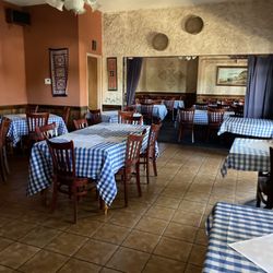 Symposium Restaurant & Pizza House - About to open!