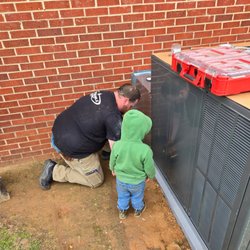 Dependable HVAC - The Dependable HVAC team finishing a packaged unit installation in Mount Gilead, NC -- trusted local HVAC experts serving fami...