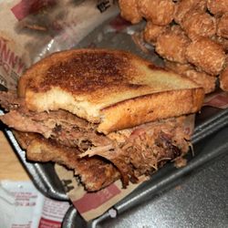 Sonny's BBQ - Classic smoked pork BBQ on garlic toast