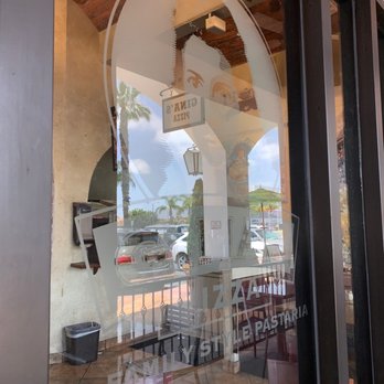 Gina's Pizza - a reflection in the window - Italian Near Me - Costa Mesa, California