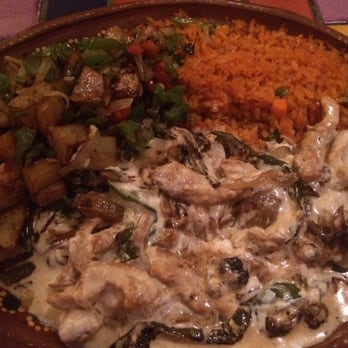 Los Altos Mexican Grill - Chicken with cream sauce dish. Potatoes and rice as the sides. - Mexican Near Me - Goose Creek, South Carolina