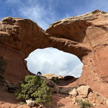 Arches National Park - The broken arch (and me, doing a backbend in the lower left part of the arch - for size comparison lol) - Parks Near Me Arches National Park - The broken arch (and me, doing a backbend in the lower left part of the arch - for size comparison lol) - Parks Near Me