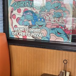 Michaelangelos Pizza & Subs - When you find a slice shop with OG Ninja Turtles posters in 2026, you know it's the right place!