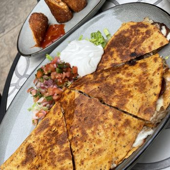 Mirella’s Tavern - Duck quesadilla - Italian Near Me - Chicago, Illinois Mirella’s Tavern - Duck quesadilla - Italian Near Me - Chicago, Illinois