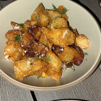 Meridian - Patatas bravos had a delish aioli type sauce at the bottom and were crispy yet soft with a grated type cheese on it delish! - New American Near Me - Dallas, Texas