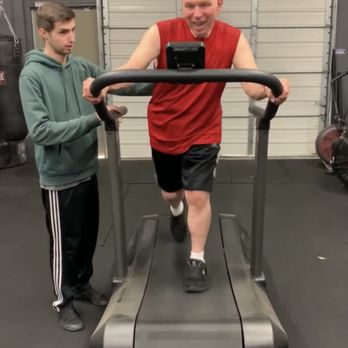Functional Patterns Sacramento - Trainer Taylor working with disabled client Mike on improving his walking. - Trainers Near Me - Sacramento, California Functional Patterns Sacramento - Trainer Taylor working with disabled client Mike on improving his walking. - Trainers Near Me - Sacramento, California