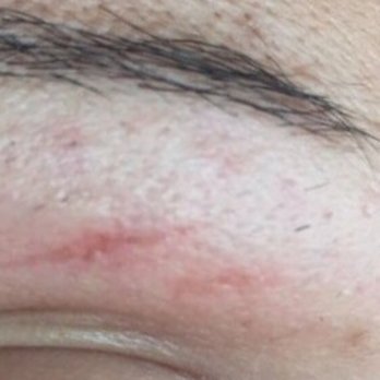 J De Vonne's Hair Today - This was two hours after waxing. Notice there is still hair that was missed and the two cuts on my eyebrow. - Hair Salons Near Me - Clawson, Michigan