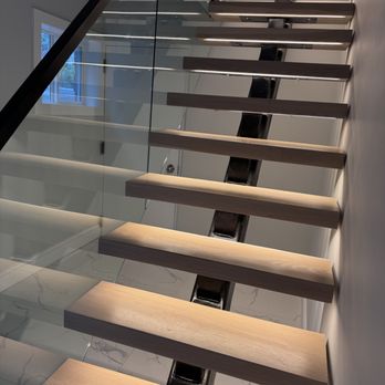 Renotec - Floating stairs with under mount lighting - General Contractors Near Me Renotec - Floating stairs with under mount lighting - General Contractors Near Me