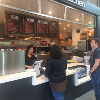 KoJa Kitchen - Ordering counter, nice dark finishes, white counter, stainless steel open mesh detail above. - Japanese Near Me - Emeryville, California KoJa Kitchen - Ordering counter, nice dark finishes, white counter, stainless steel open mesh detail above. - Japanese Near Me - Emeryville, California