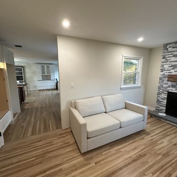 D&L Hardwood Flooring - living room with fireplace - Flooring Near Me - Bellmore, New York