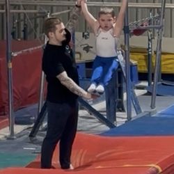World Gymnastic Academy - Last year comp photo (2025) of my son and his coach