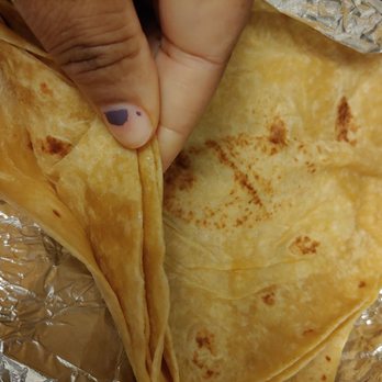 Caribbean Jerk Cuisine - If I wanted a burrito I would have ordered one. You guys should know that most people order roti are Caribbean. We know the difference. - Caribbean Near Me - Houston, Texas