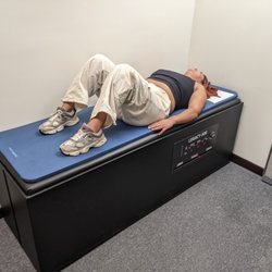 Commons Chiropractic Center - A woman getting intersegmental traction at Commons Chiropractic Center