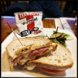 163 Taproom - Hot ham & cheese melt (capicola and American cheese panini pressed on sourdough), served w/ potato chips & spicy house pickles