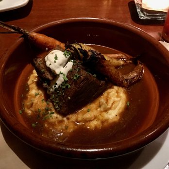 Seasons 52 - Boneless beef short rib - slow braised, stone ground cheddar grits, heritage carrots, horseradish crema - New American Near Me - Chestnut Hill, Massachusetts Seasons 52 - Boneless beef short rib - slow braised, stone ground cheddar grits, heritage carrots, horseradish crema - New American Near Me - Chestnut Hill, Massachusetts