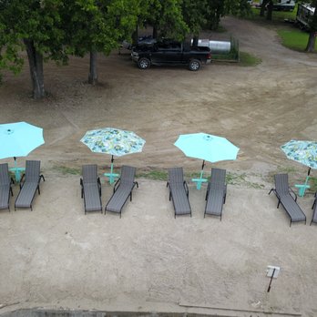 Tia Coco's - several lawn chairs and umbrellas - Mexican Near Me - Point, Texas Tia Coco's - several lawn chairs and umbrellas - Mexican Near Me - Point, Texas