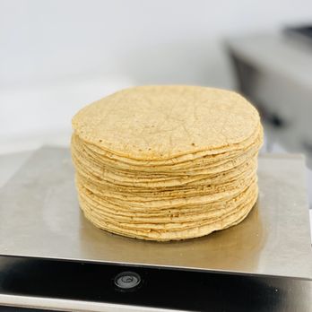 Tortillas Aries - a stack of tortillas on a scale - International Grocery Near Me - McAllen, Texas Tortillas Aries - a stack of tortillas on a scale - International Grocery Near Me - McAllen, Texas