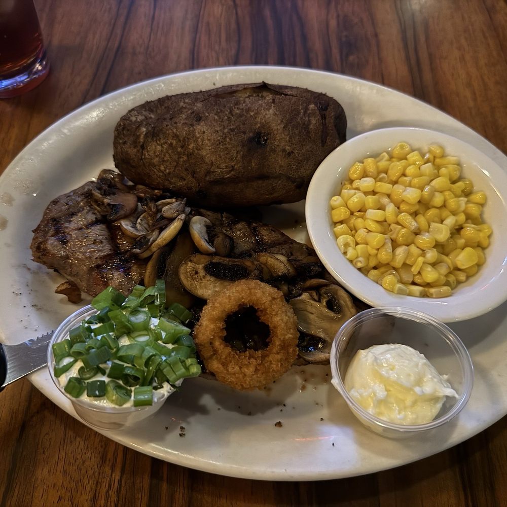 Strip steak with all the trimmings. Added the mushrooms. Amazing Strip steak with all the trimmings. Added the mushrooms. Amazing