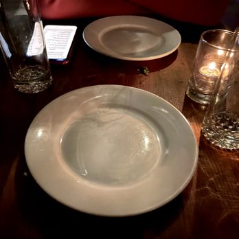 Barbès Restaurant - Leftover food on the table (before we ordered anything) - French Near Me - Hoboken, New Jersey