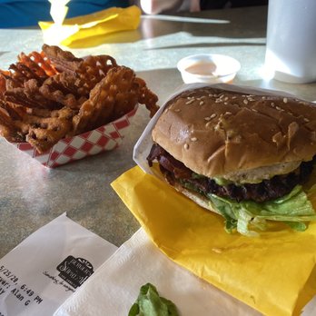 Burgers Supreme - This is the bacon guacamole burger with the sweet potato waffle fries. - Burgers Near Me - Provo, Utah Burgers Supreme - This is the bacon guacamole burger with the sweet potato waffle fries. - Burgers Near Me - Provo, Utah
