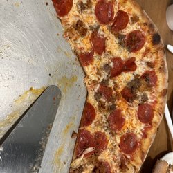 Shopey's Pizza - 5/8 of the large meat trio pizza.