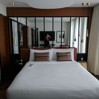 Renaissance Paris Republique Hotel - Cozy bed, lots of cool mirrors and lights surrounding. - Hotels Near Me - Paris, 75